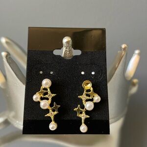Gold star earrings